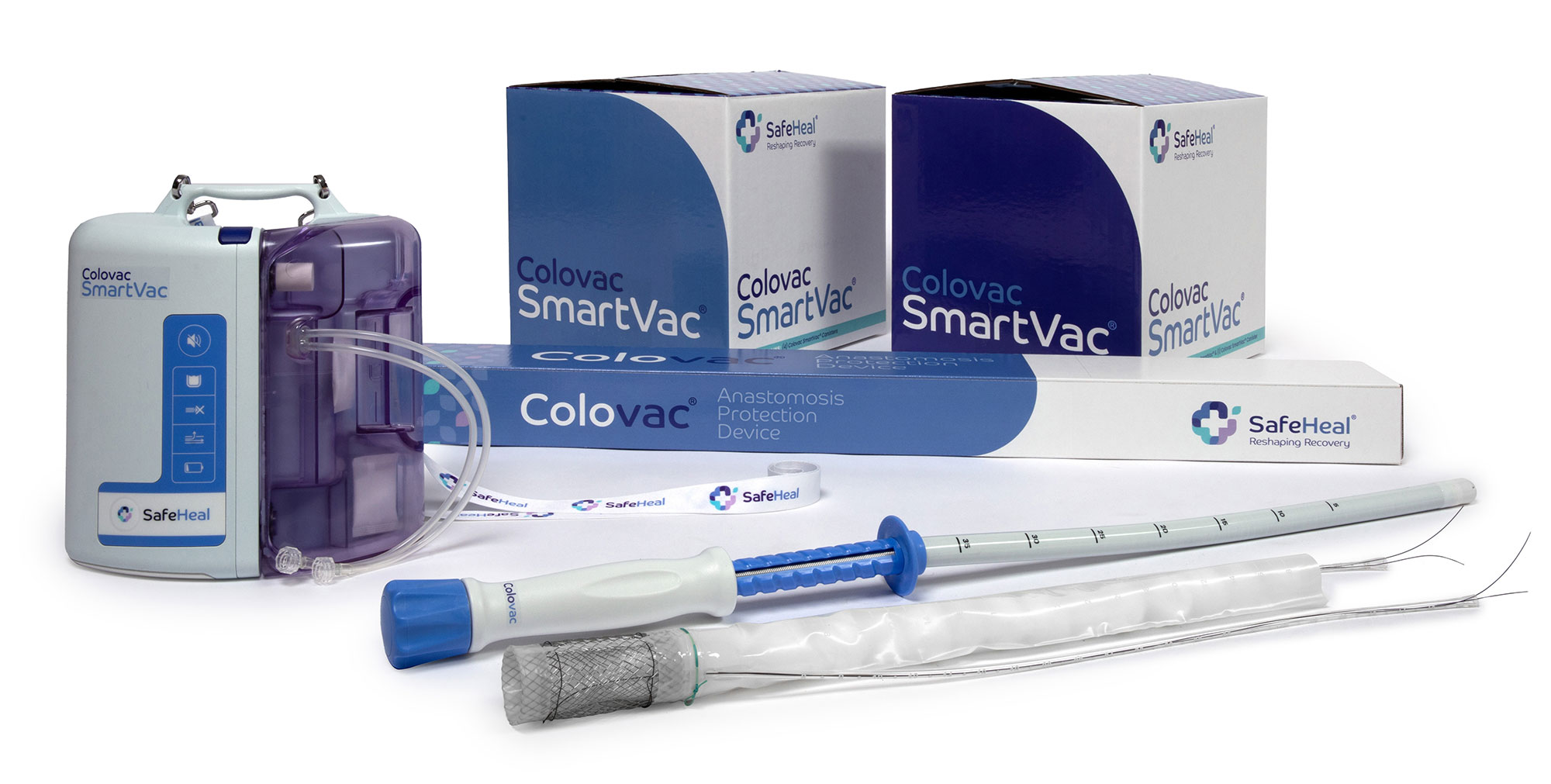 A series of parts, tubes, and the Colovac SmartVac with some boxes against a white background